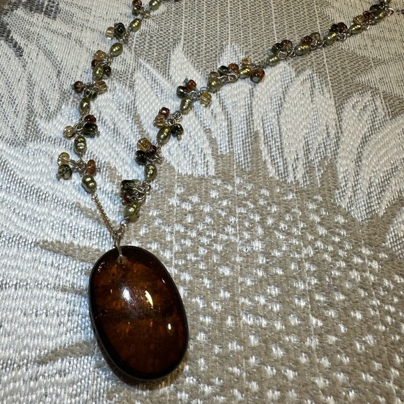 Beautiful amber stone hangs from chain with delicate clusters of small beads. - Picture 13 of 13